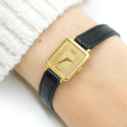 Montre CHOPARD Mini en or jaune et cuir