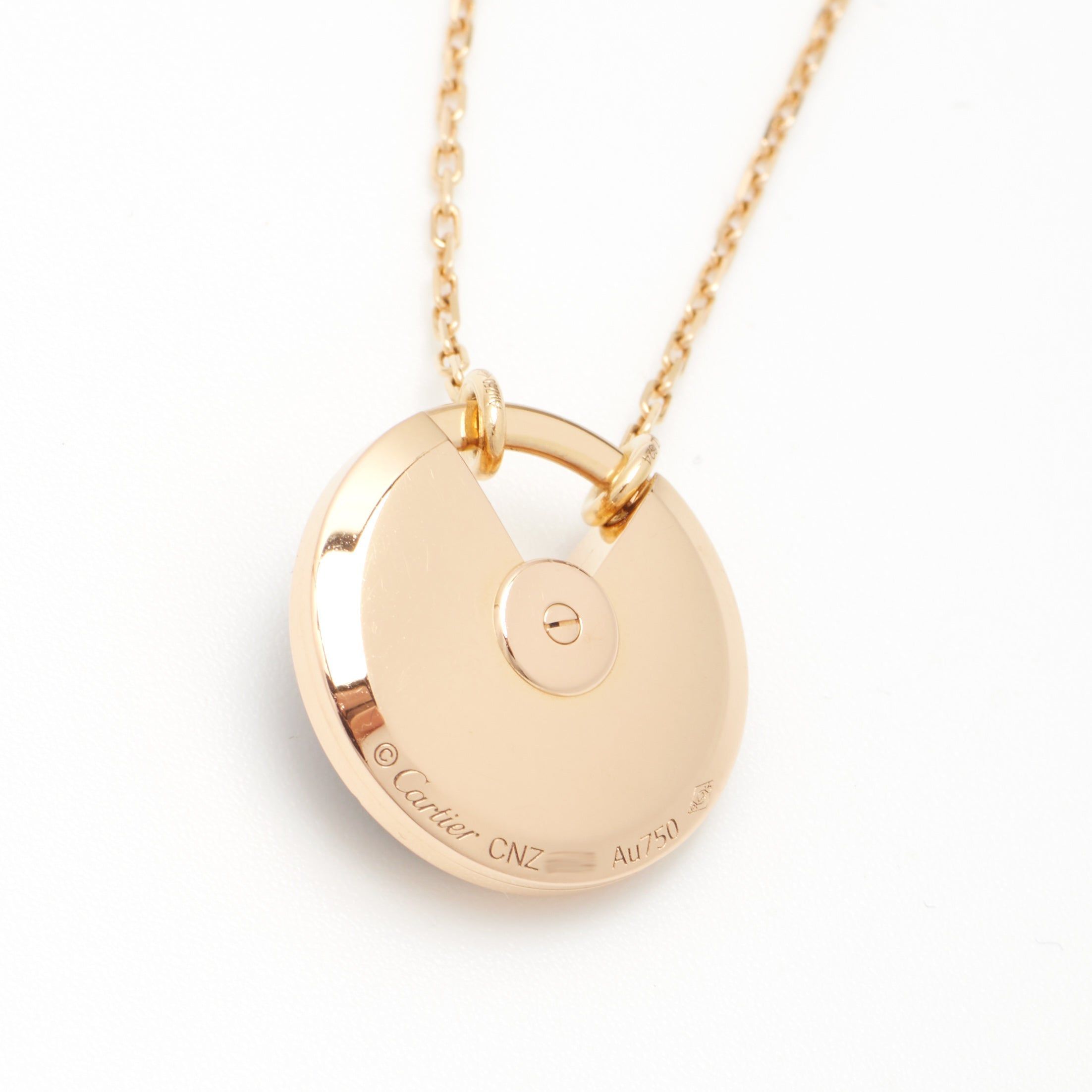 Sautoir Cartier Amulette PM en or rose et bois d'amourette