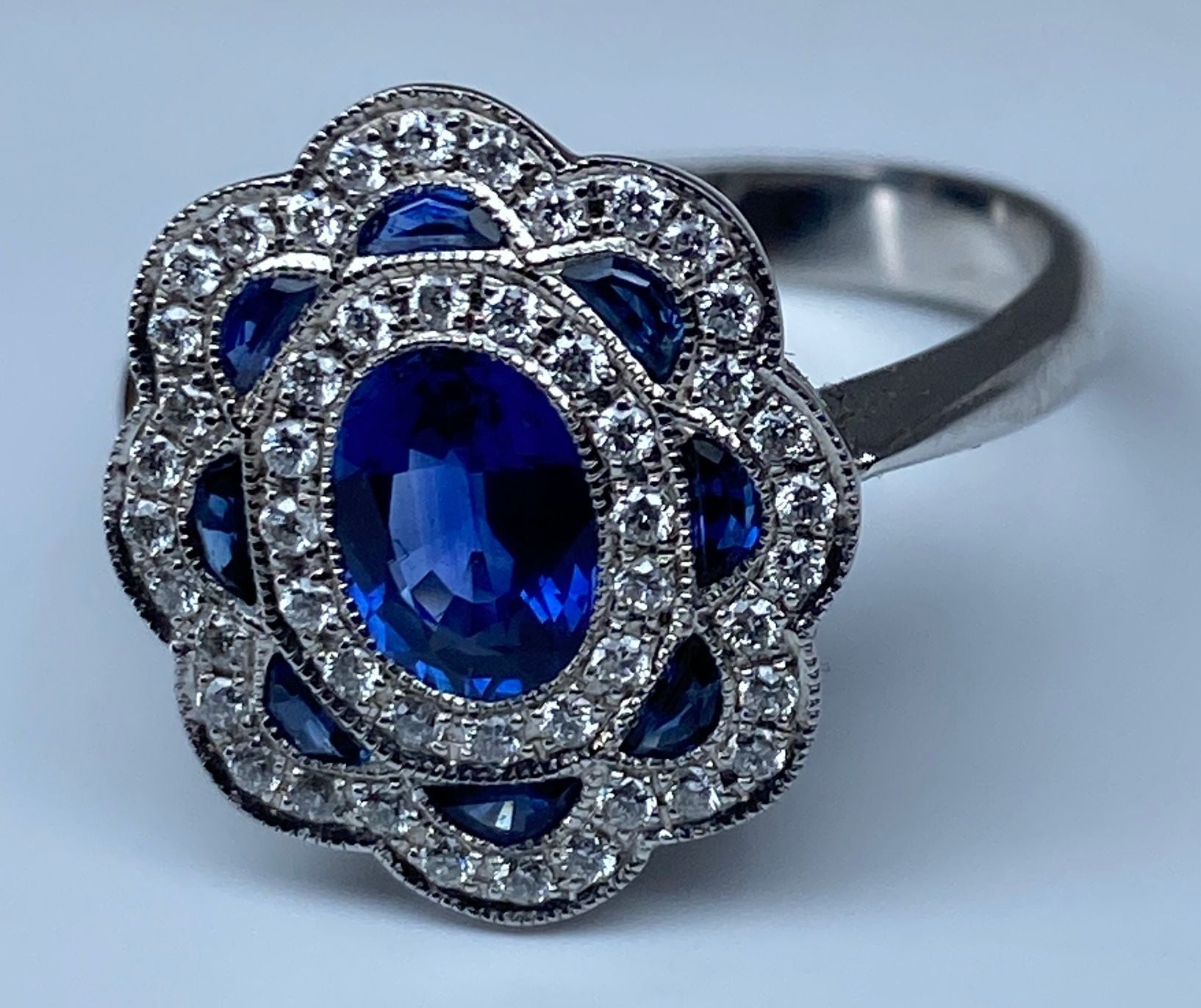 18k gold sapphire and diamond daisy ring