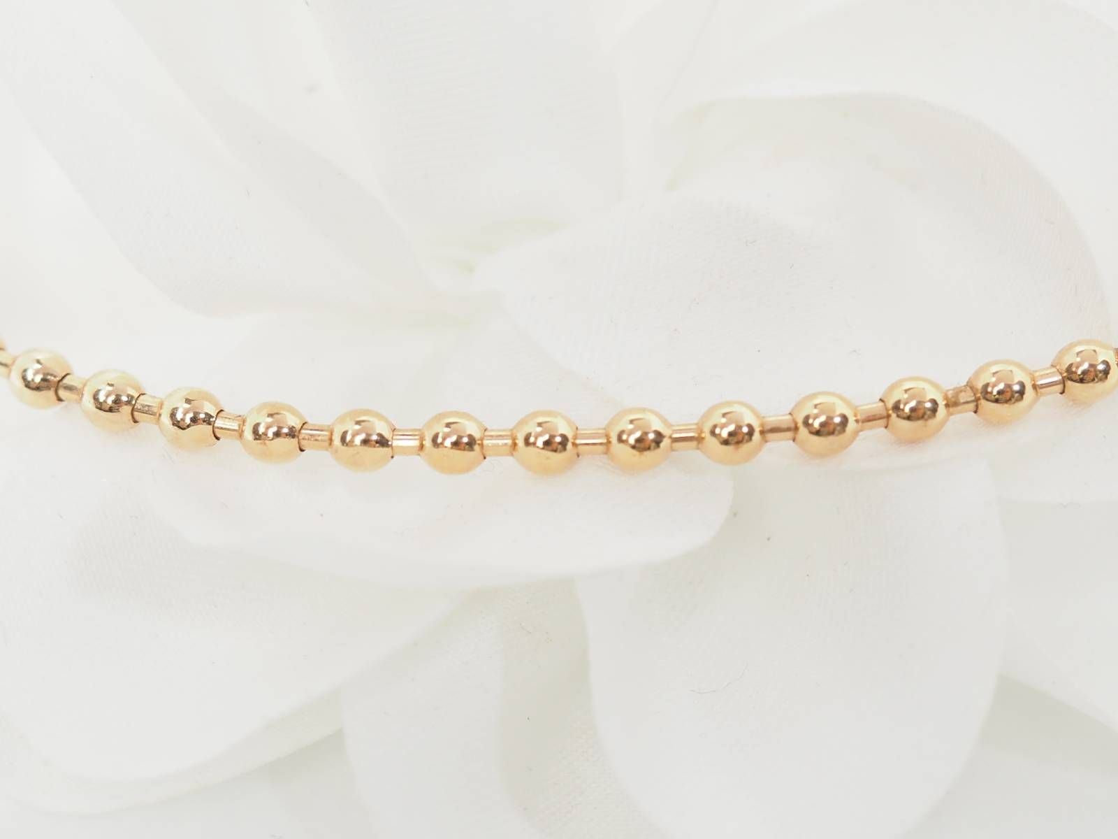 Collier boules rigide et trèfles en or rose et diamants