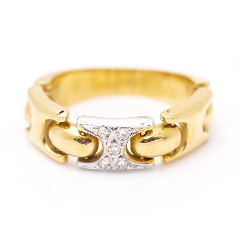 Bague articulée en or bicolore et diamants. Deuxième main