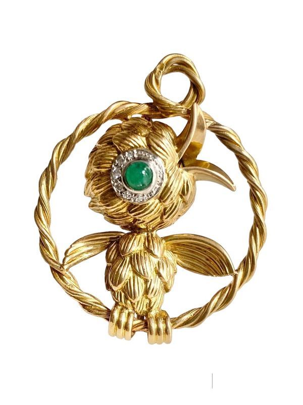 Broche en or jaune 18k et platine représentant un oiseau