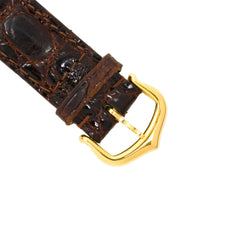 Montre CARTIER "Diabolo" en or jaune, cuir et saphir