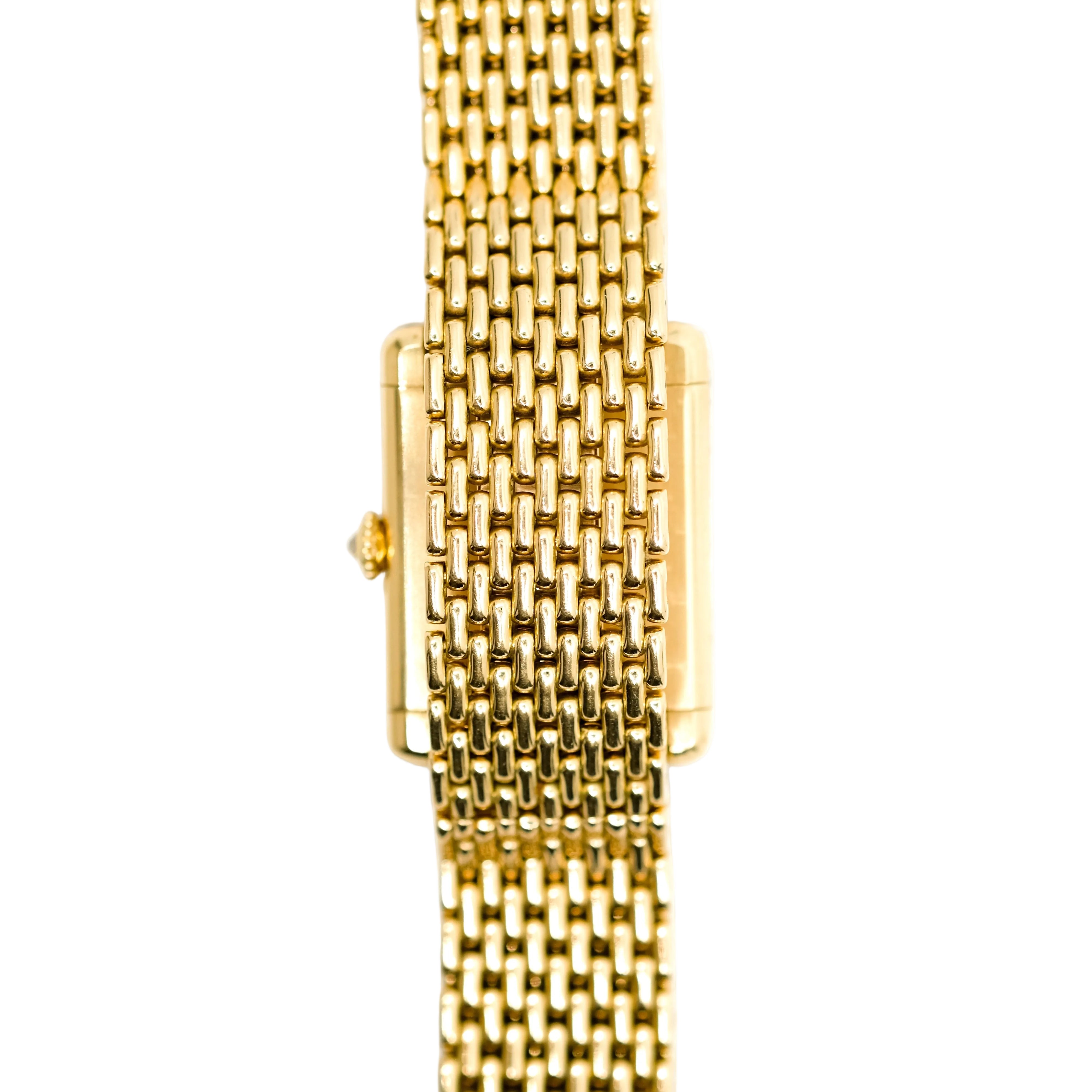 Montre CARTIER Tank Louis en or jaune et diamants