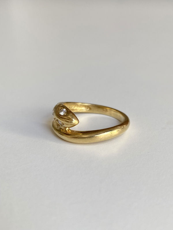 Bague en or jaune 18k en forme de serpent et diamants