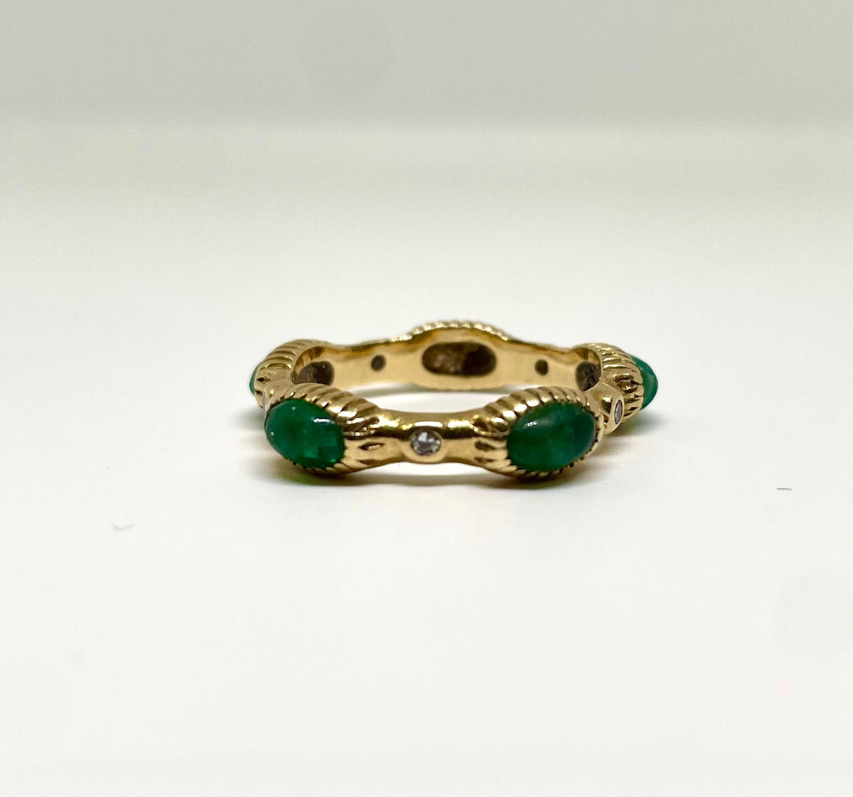 Cartier-Bague or jaune, émeraudes et diamants