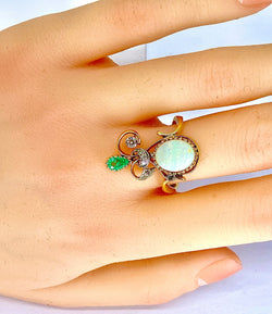 Bague en or jaune et or blanc 18 carats en opale, émeraude et diamants
