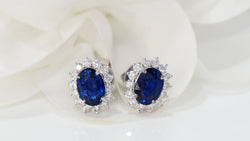 Boucles d'oreilles marguerite en or blanc Saphirs et diamants