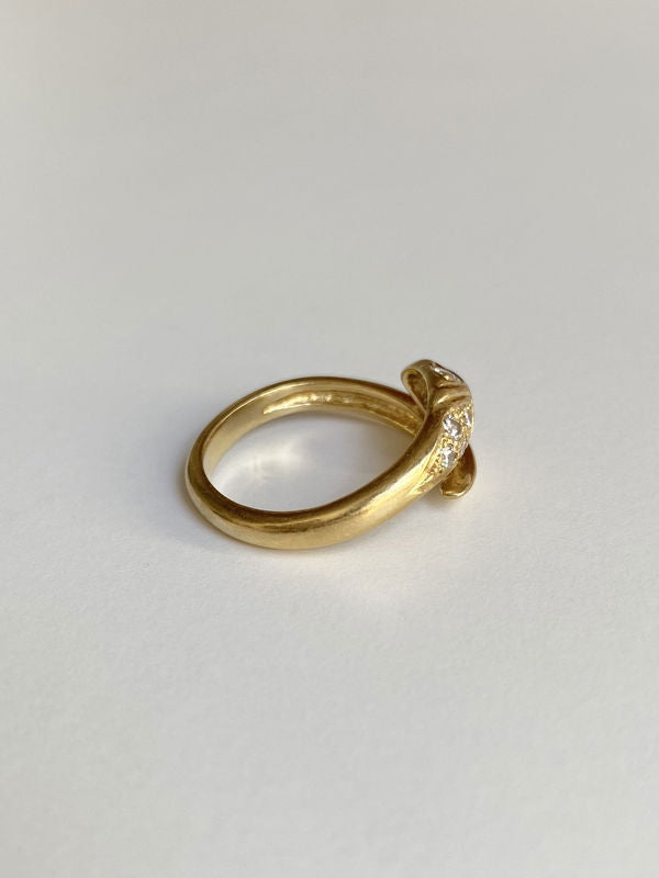 Bague en or jaune 18k en forme de serpent et diamants