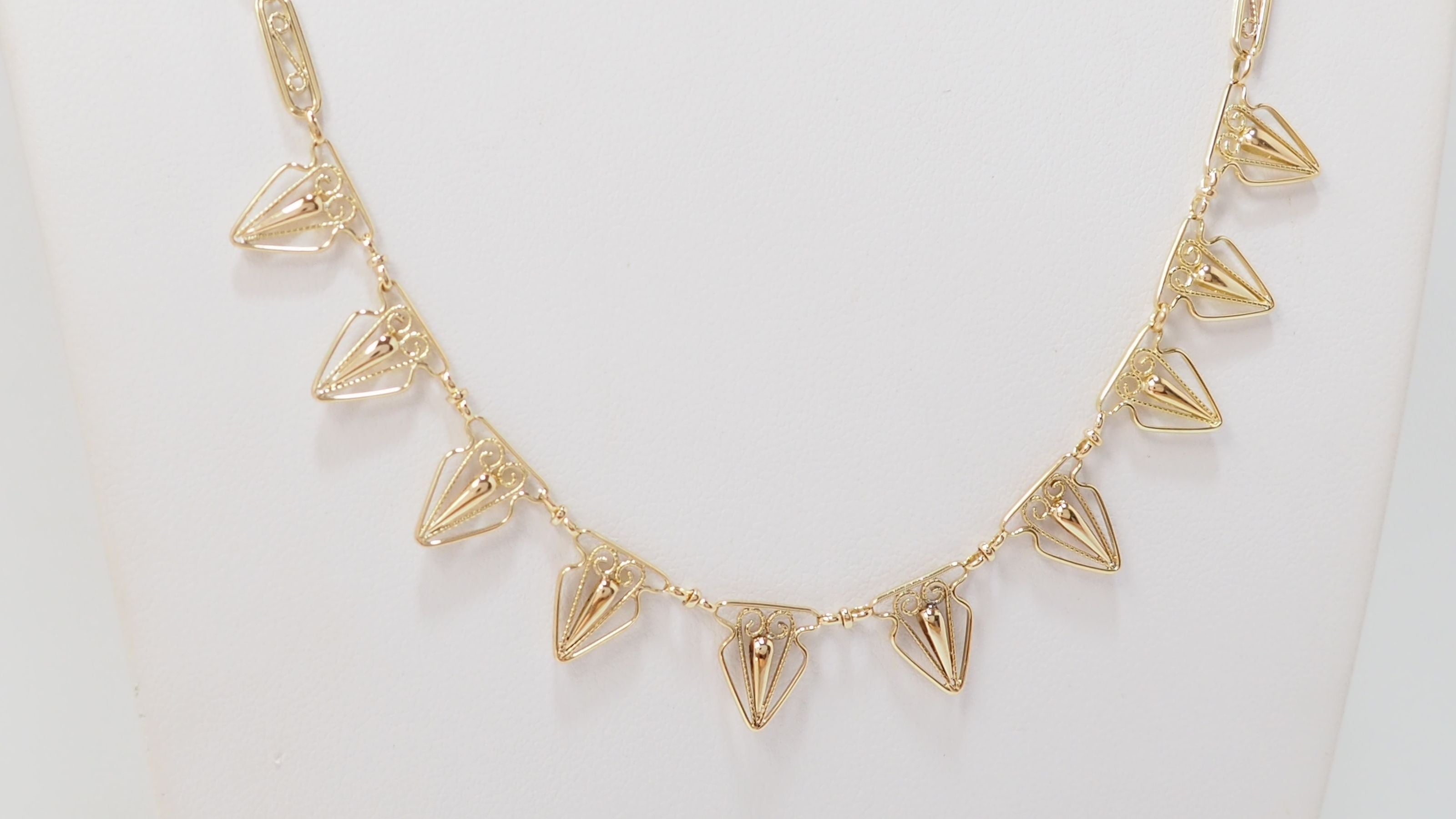 Collier draperie ancien en or jaune