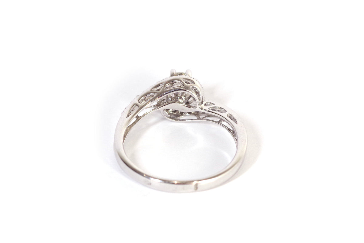 Bague tourbillon diamants en or
