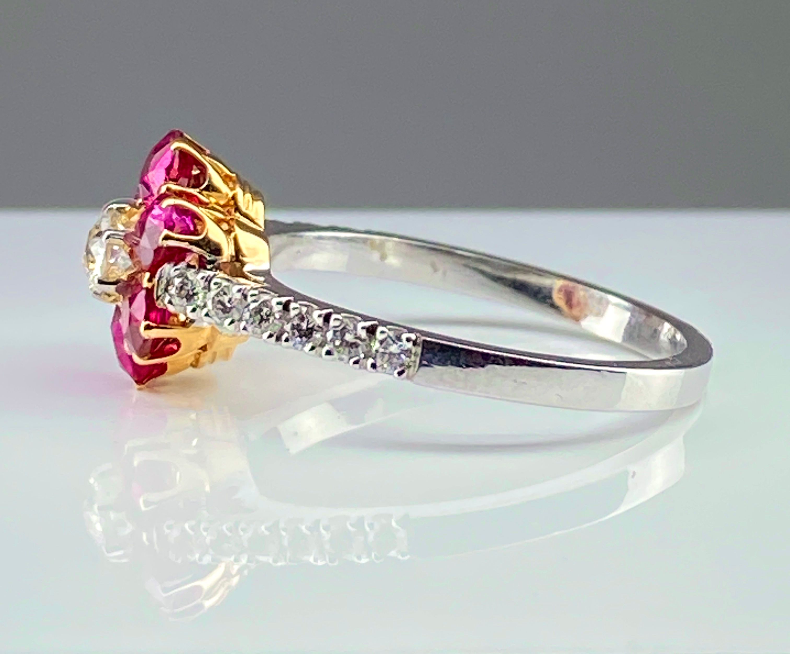 Bague marguerite en or 18 carats en rubis et diamants