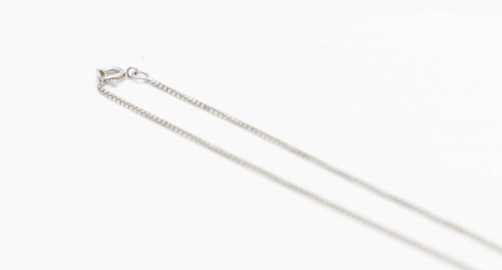 Collier maille solide en or blanc et diamant