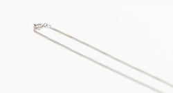 Collier maille solide en or blanc et diamant