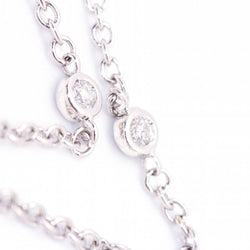 Collier SUNFLOWER en or rose et diamants.