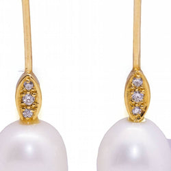 Boucles d'oreilles ovales en perles et diamants