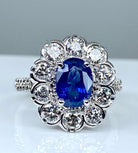 Bague marguerite en or 18 carats en saphir et diamants