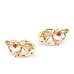 Boucles d'oreilles VINGT en or, diamants et rubis. Deuxième main