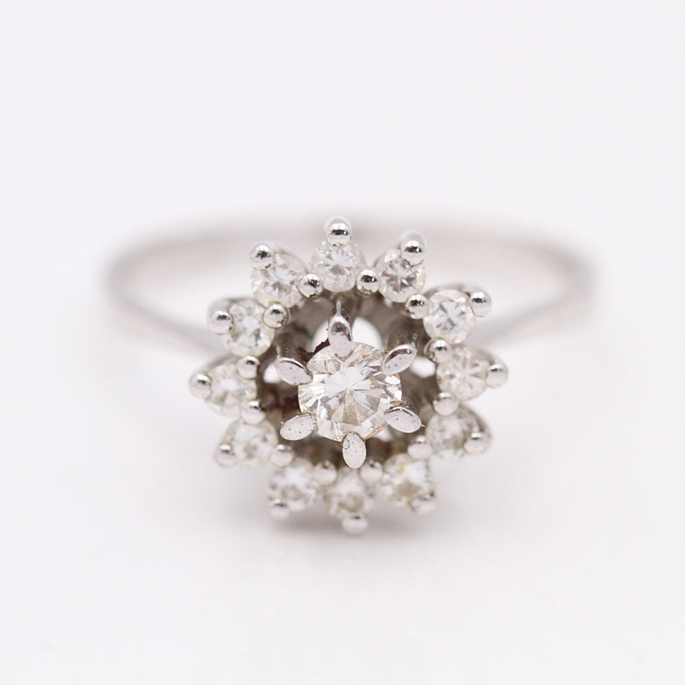 Bague rosette en or d'occasion avec diamants