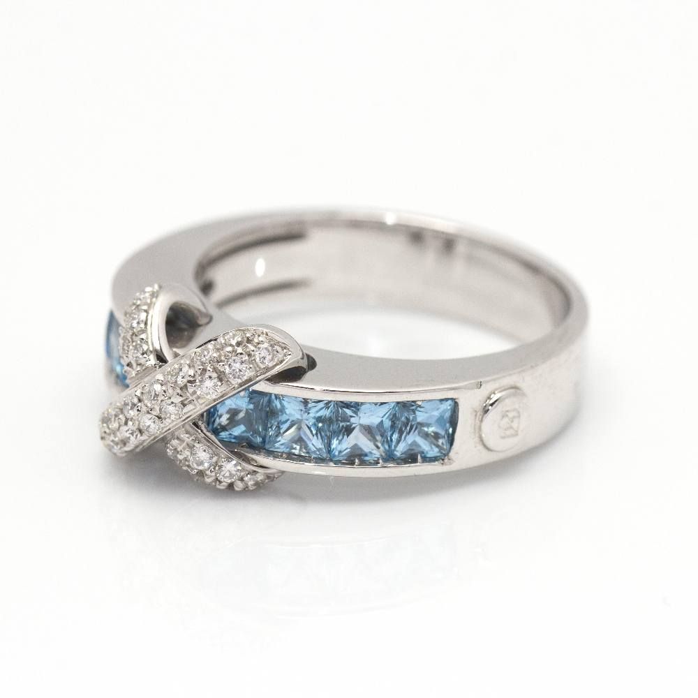 Bague en or blanc, topazes et diamants d'occasion