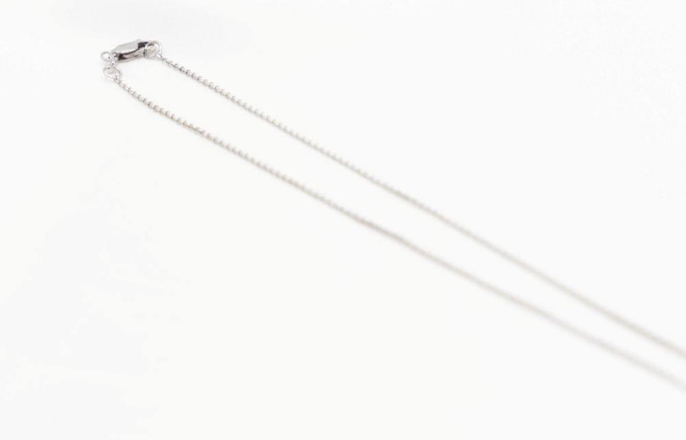 Collier maille jaseron en or blanc et diamant