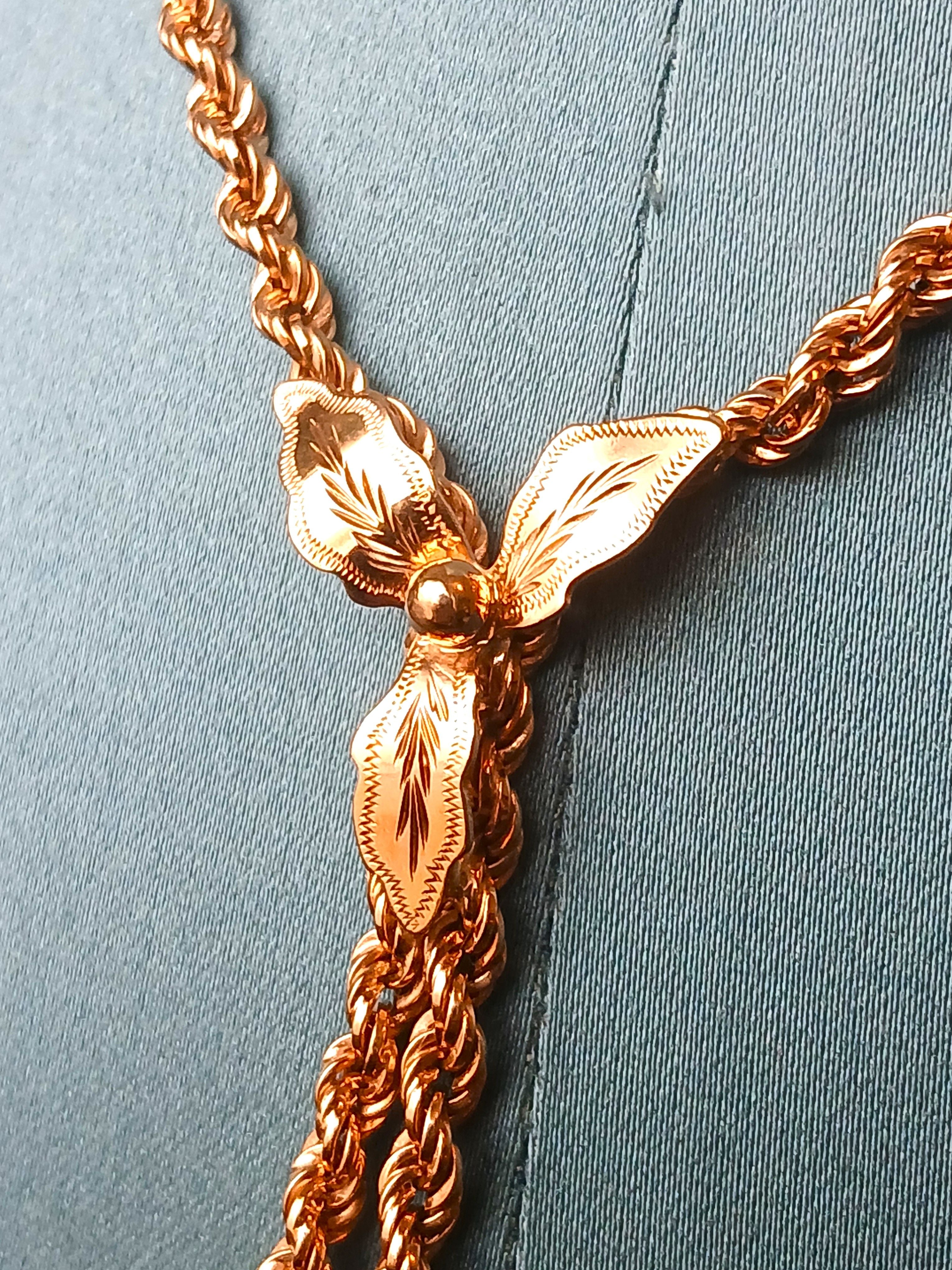 Sautoir ancien à motif floral en or jaune