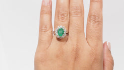 Marguerite ring in white gold, emerald and diamonds