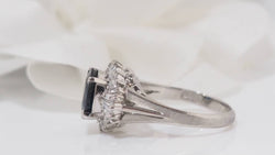 White gold, oval sapphire and diamond ring 