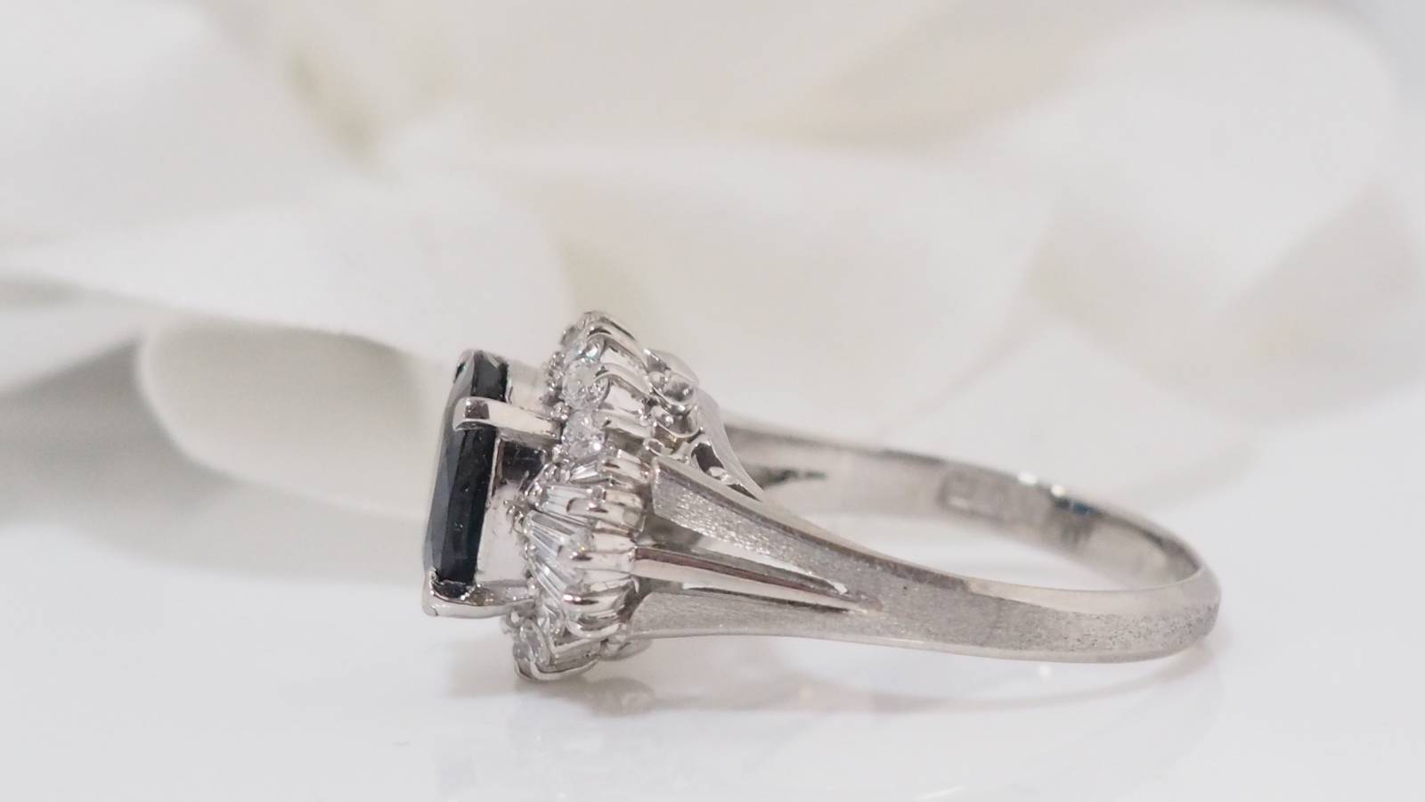 White gold, oval sapphire and diamond ring 