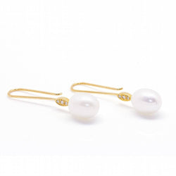 Boucles d'oreilles ovales en perles et diamants