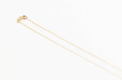 Collier maille forçat en or jaune et diamant