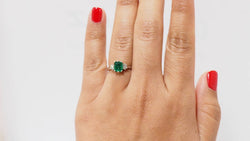White gold, emerald and diamond ring 