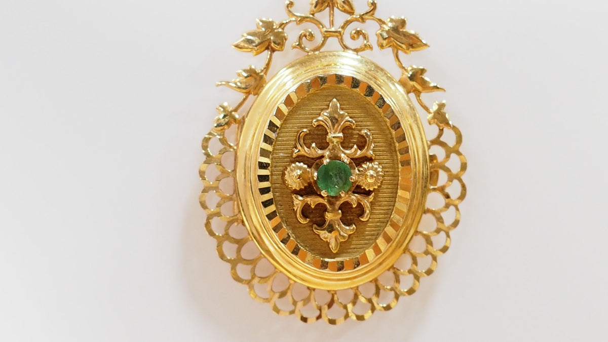 Pendentif porte photo en or jaune et émeraude