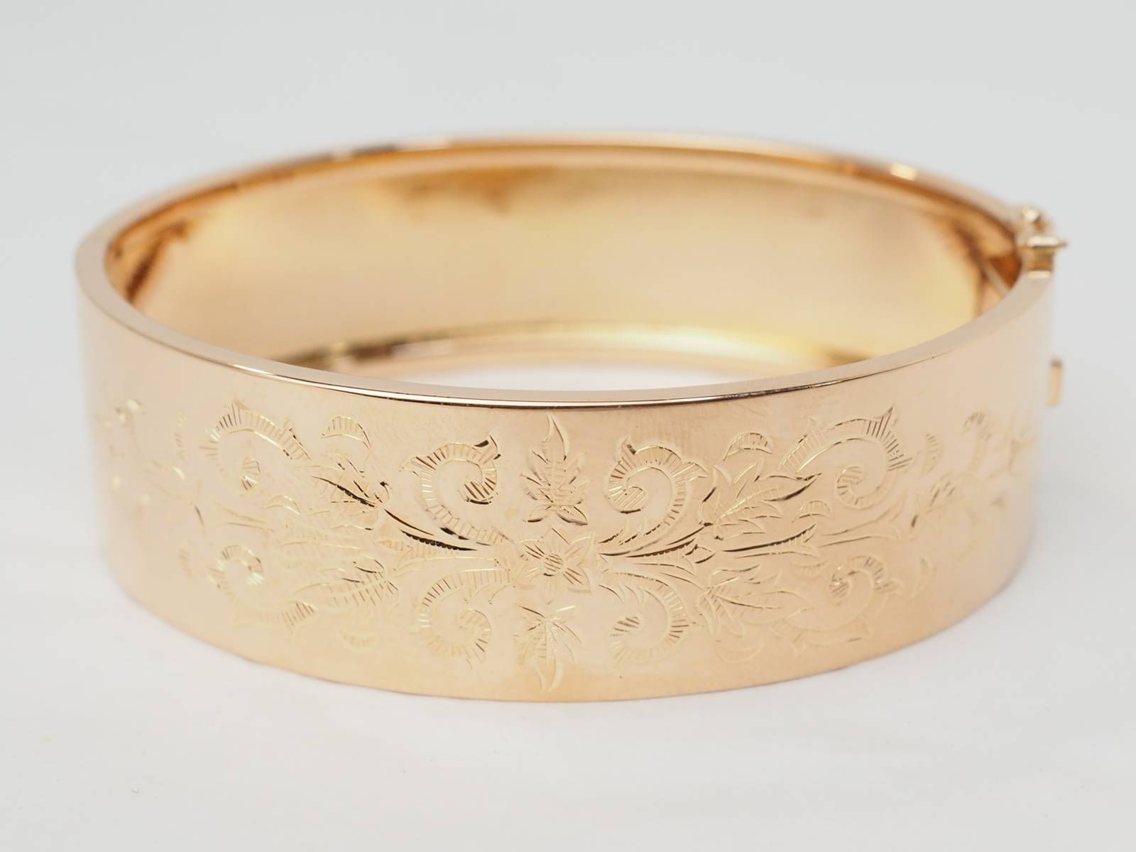 Bracelet jonc décor floral en or rose