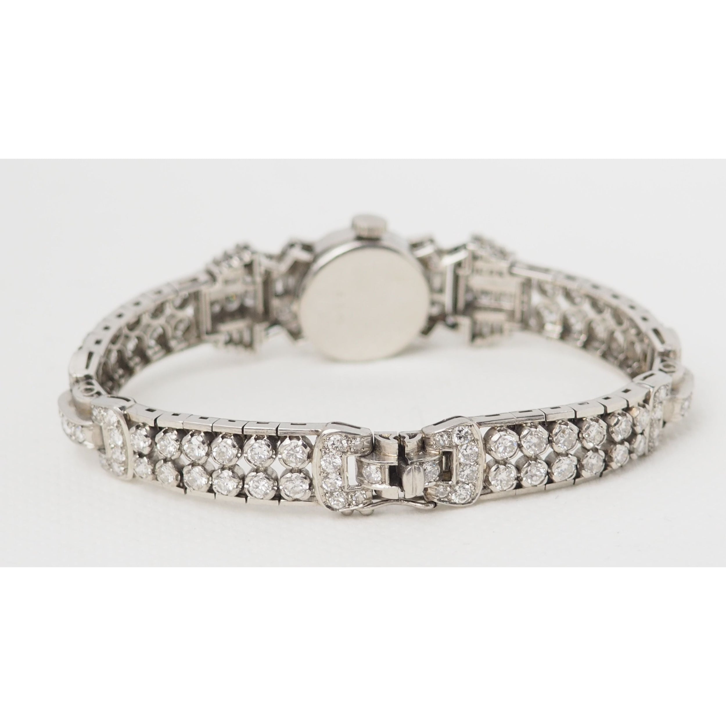 Montre ancienne en or platine et diamants