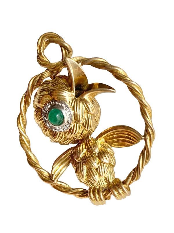 Broche en or jaune 18k et platine représentant un oiseau