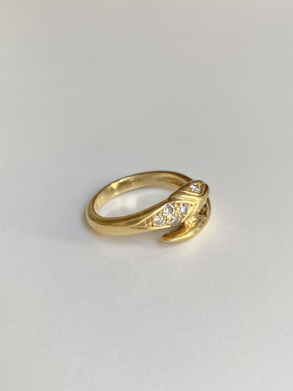 Bague en or jaune 18k en forme de serpent et diamants