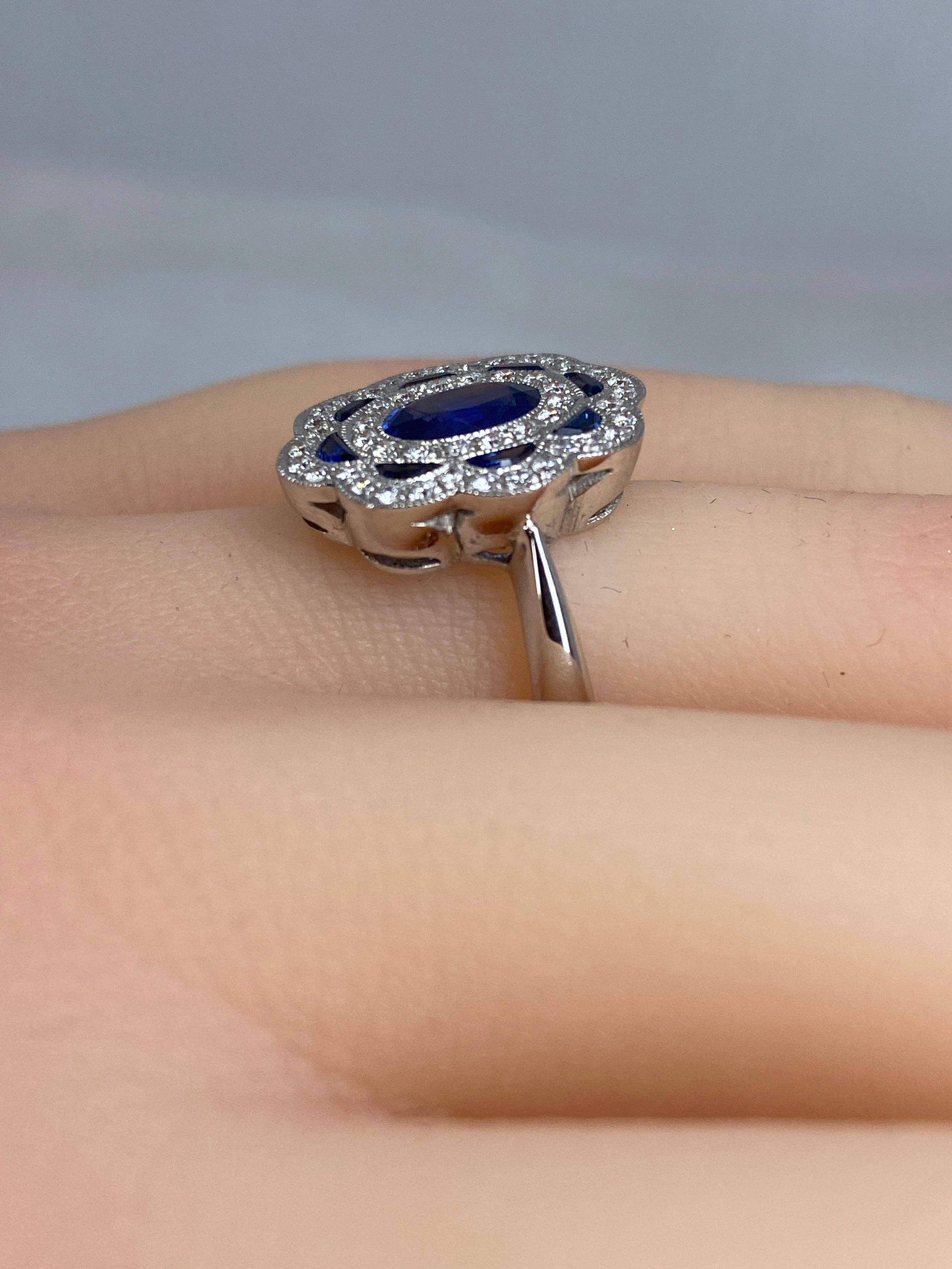 18k gold sapphire and diamond daisy ring