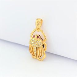 Pendentif animalier en or jaune diamants et rubis