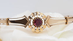 Rose gold and garnet bracelet