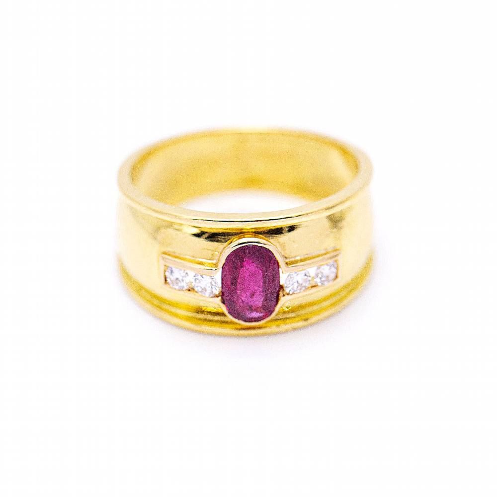 Bague en or avec rubis de taille ovale  d'occasion