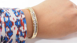 Opening bangle in yellow gold and diamonds 