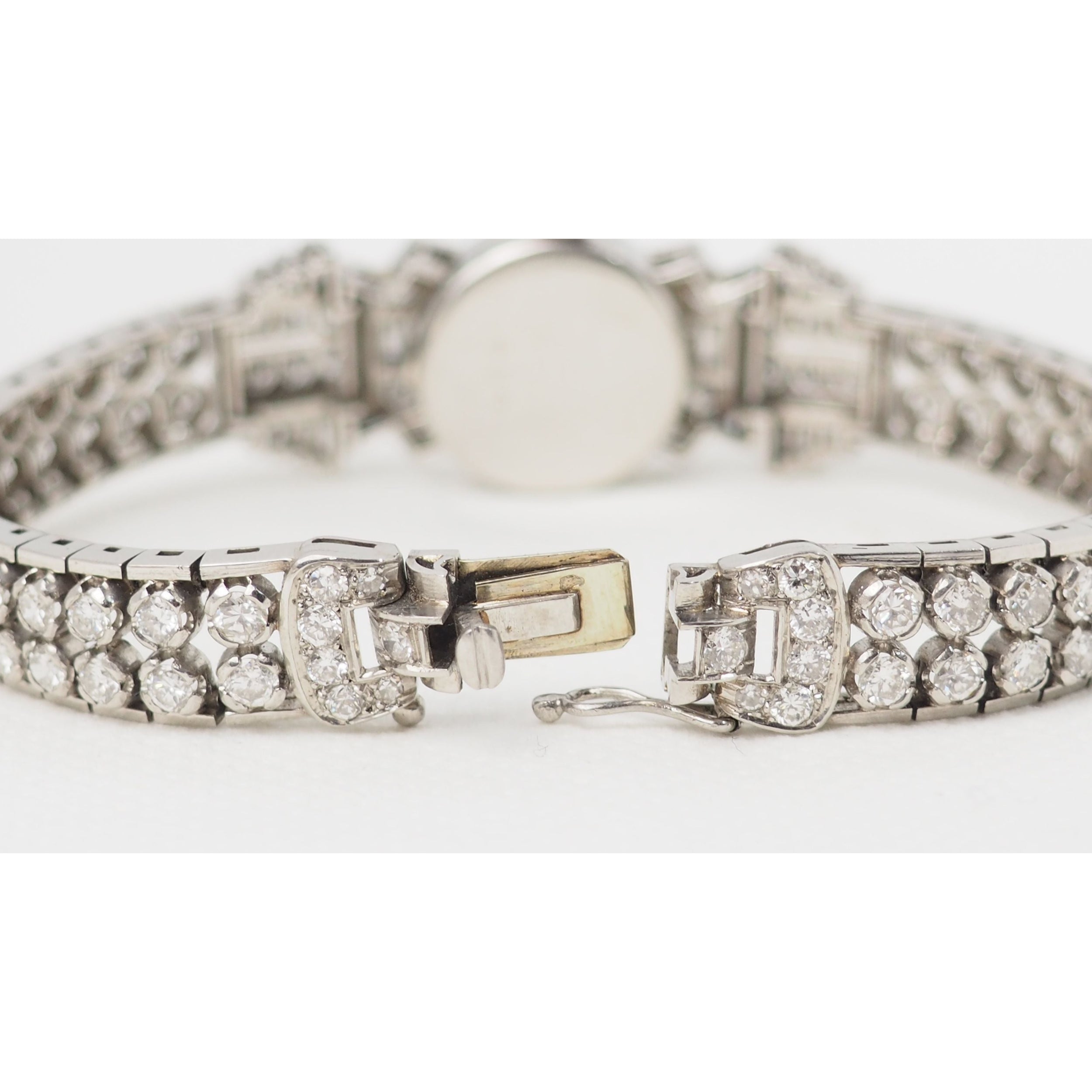 Montre ancienne en or platine et diamants