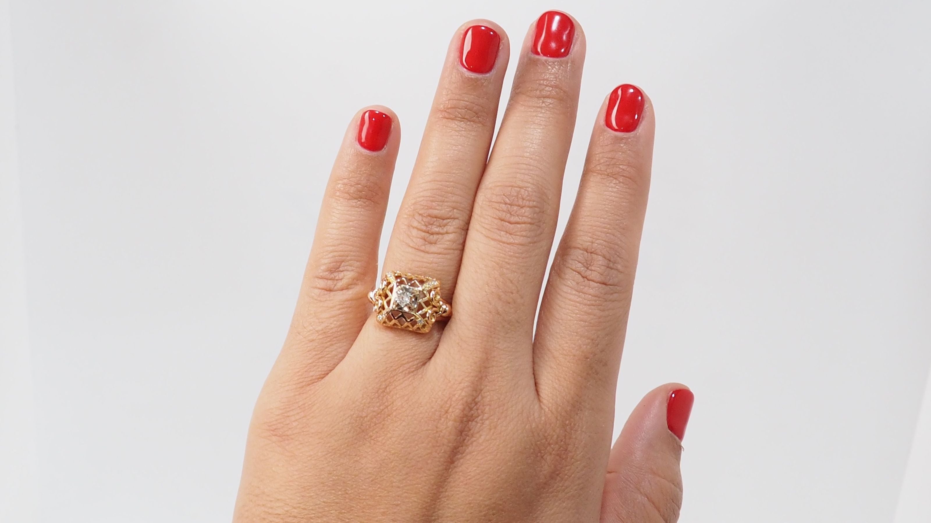 Bague ajourée en or jaune et diamant