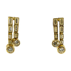 Boucles d’oreilles en or 18 carats en diamants baguettes et diamants ronds