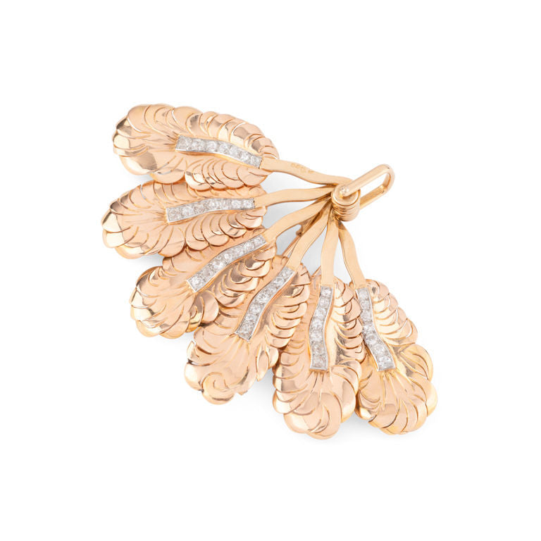 Broche Clip MELLERIO "Eventail" en or jaune, platine et diamants