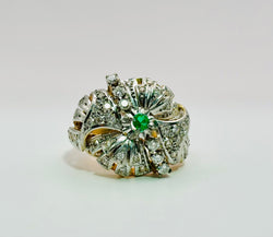 Bague en or jaune et blanc et diamants et émeraude