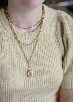 Médaillon ouvrant croix perles sur or - Castafiore