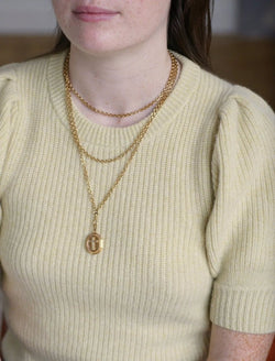 Médaillon ouvrant croix perles sur or - Castafiore