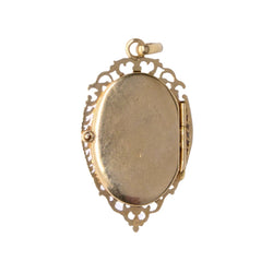 Médaillon porte-photo en or jaune, émail rouge et perle